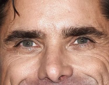 John Stamos eye color